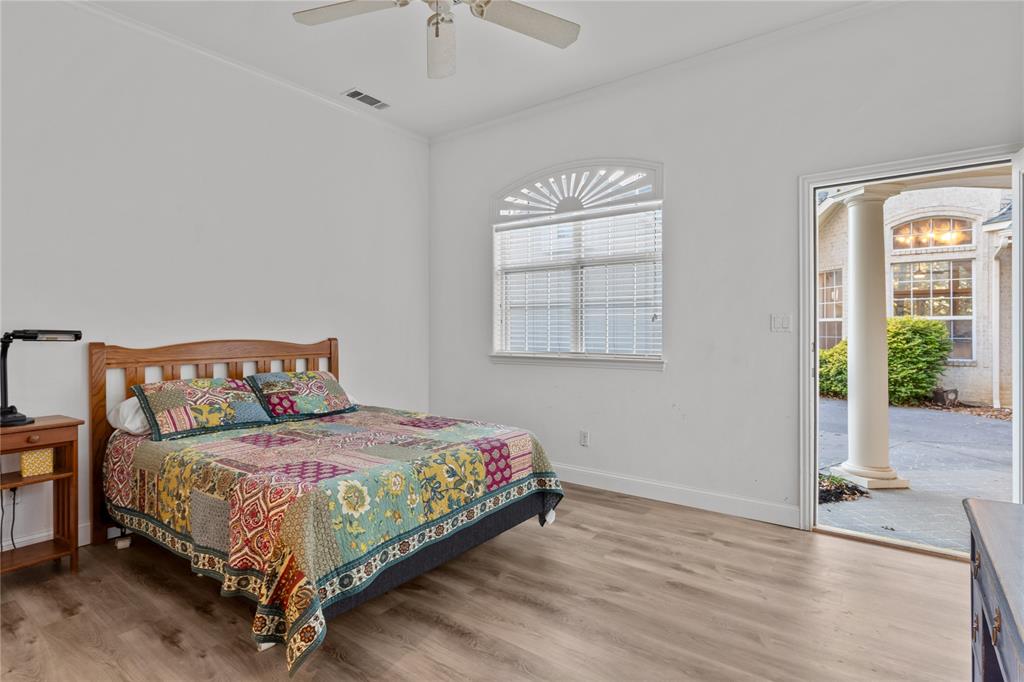 10984 Stagecoach Pass Pilot Point, TX 76258 - Photo 26 of 40 a bedroom with a bed and window