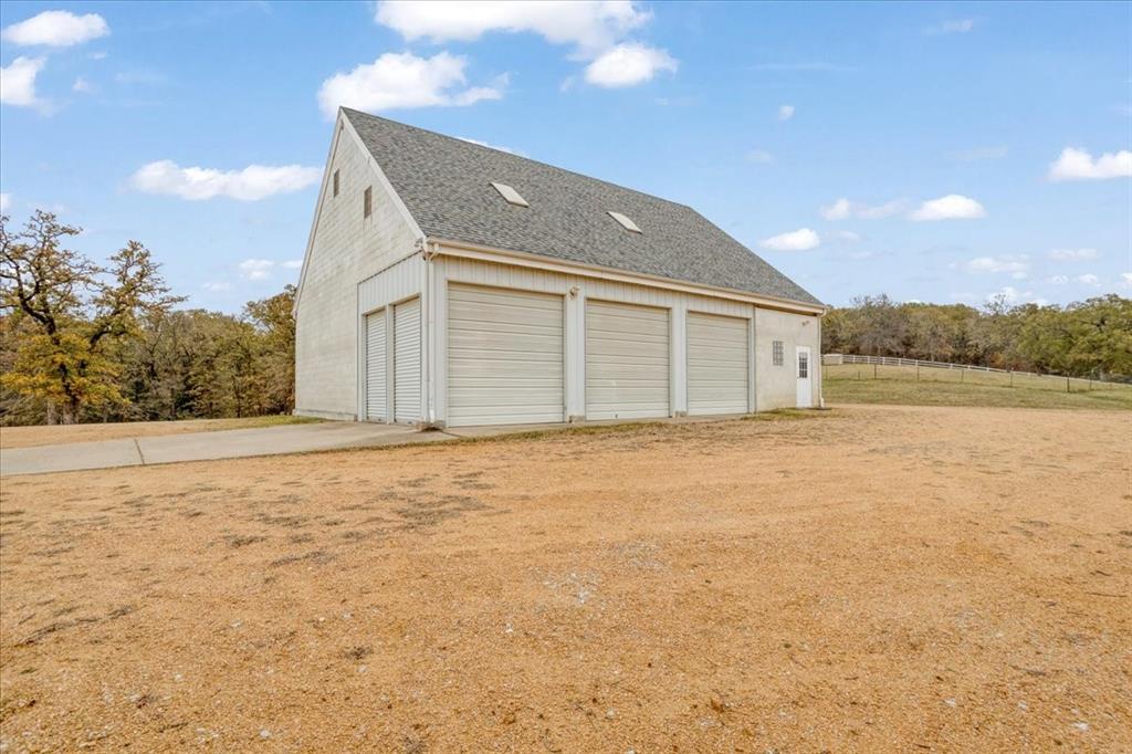 10984 Stagecoach Pass Pilot Point, TX 76258 - Photo 7 of 40 a view of wooden house and ocean view