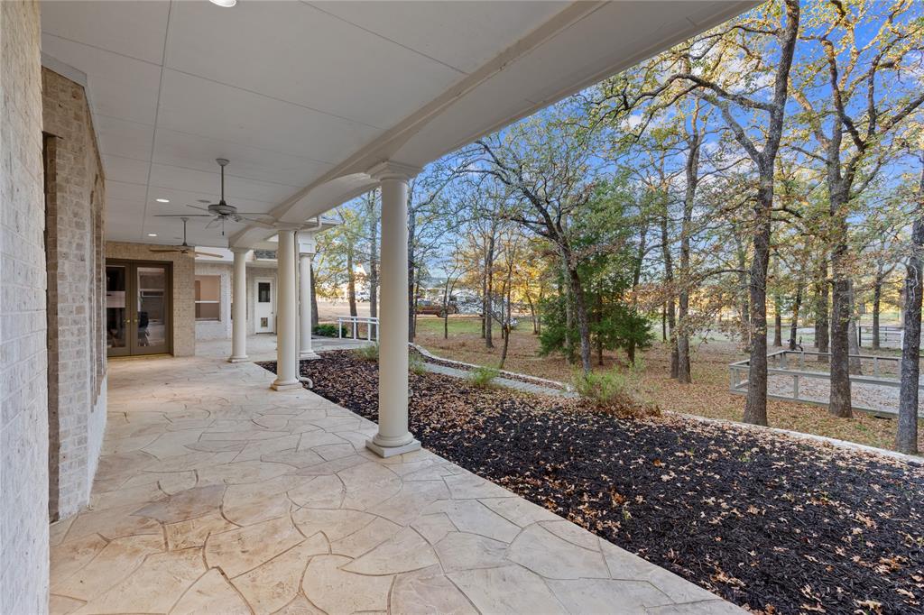 10984 Stagecoach Pass Pilot Point, TX 76258 - Photo 10 of 40 a view of a entrance gate of the house