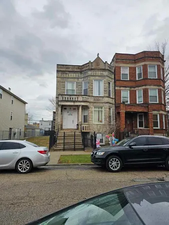 a view of a cars parked in front of a building