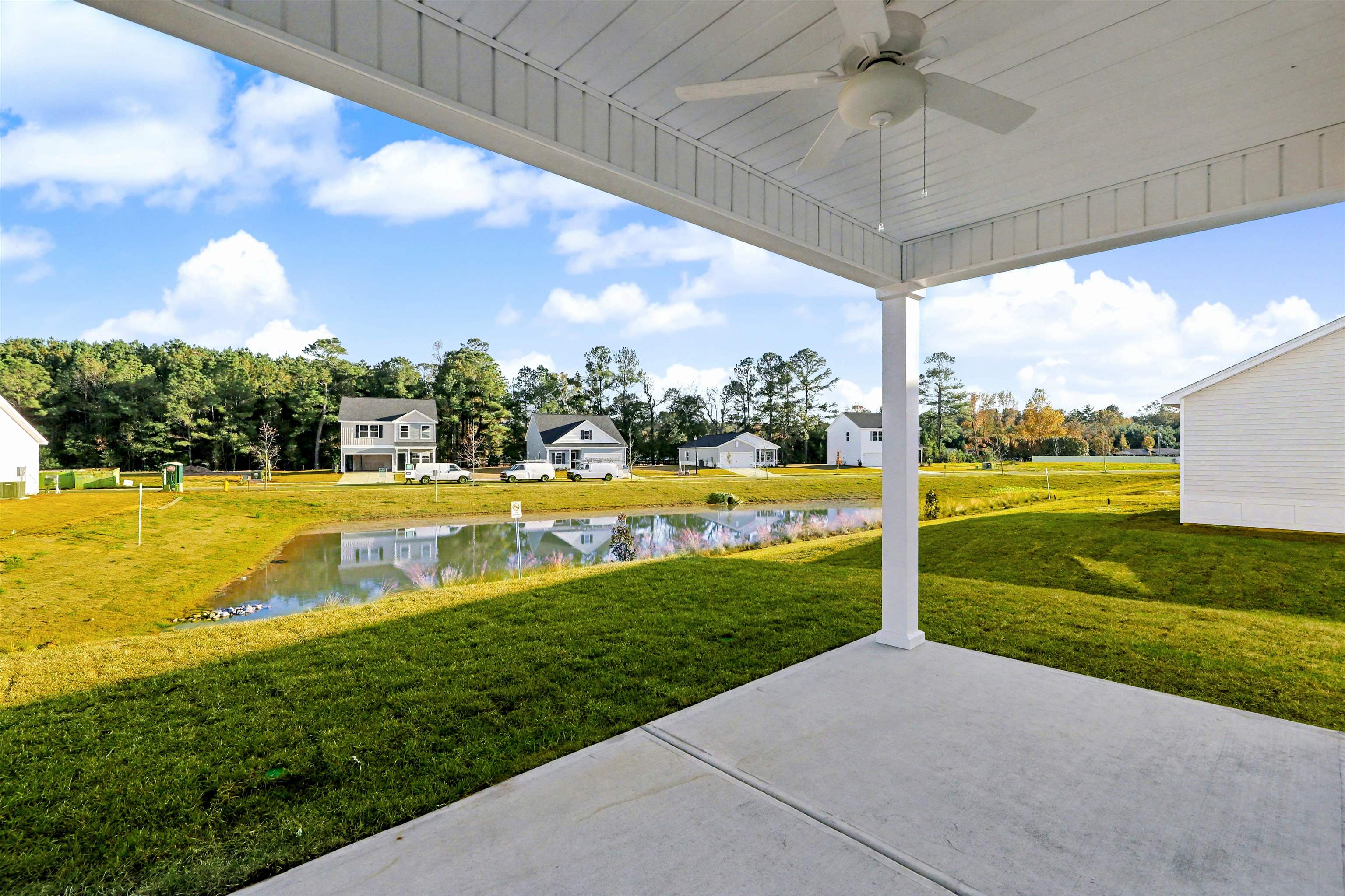 1118 Hainer Place Drive Conway, SC 29526 - Photo 24 of 28 View of patio / terrace with a water view, a ceiling fan, and a residential view