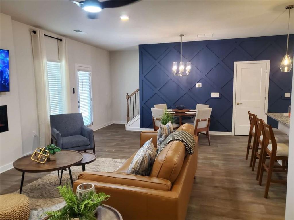 5372 Tolar Road South Fulton, GA 30213 - Photo 17 of 26 a living room with furniture and a chair