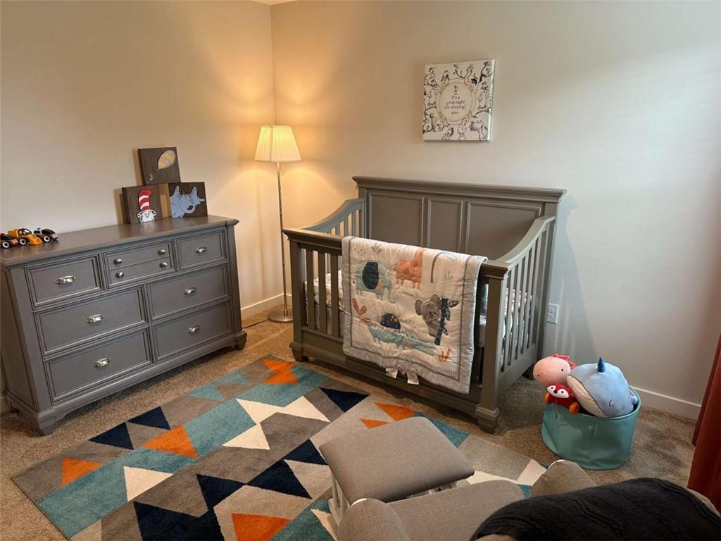 5372 Tolar Road South Fulton, GA 30213 - Photo 25 of 26 a bedroom with a bed and a painting on the wall