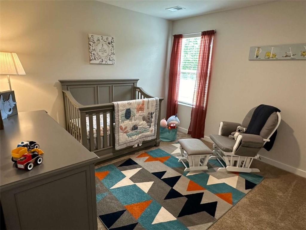5372 Tolar Road South Fulton, GA 30213 - Photo 26 of 26 a living room with furniture and rug