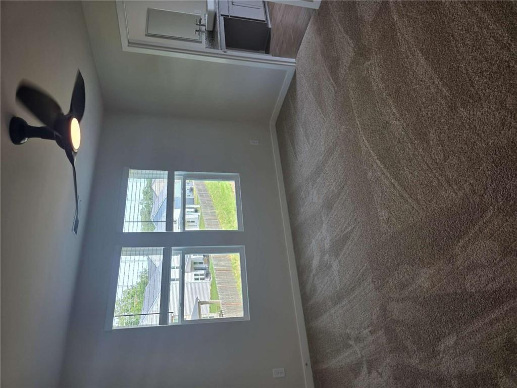 5372 Tolar Road South Fulton, GA 30213 - Photo 3 of 26 an empty room with windows