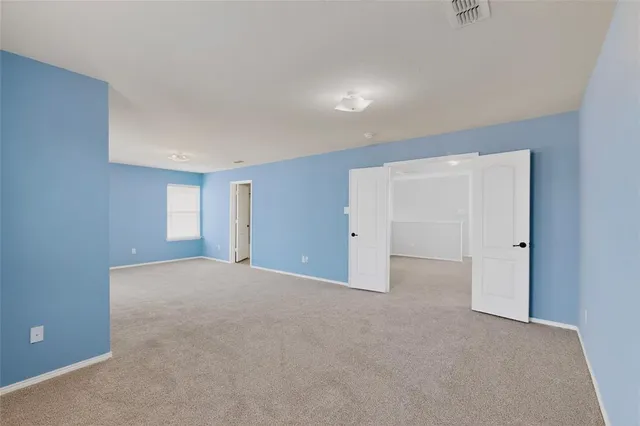 a bathroom with a sink vanity and mirror