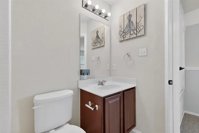 a view of a balcony with wooden floor