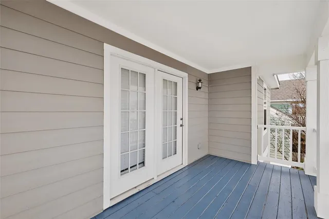 an aerial view of a residential houses with outdoor space