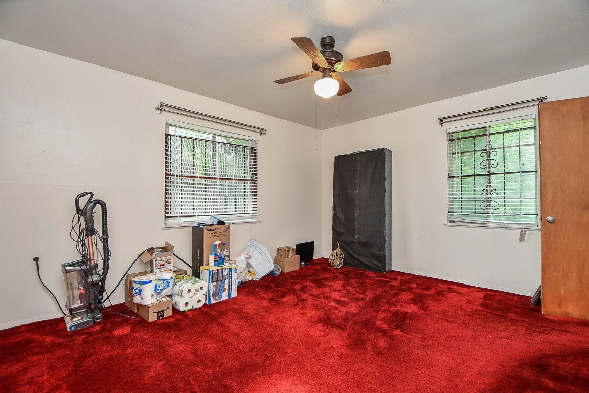 5522 Nassau Road Houston, TX 77021 - Photo 13 of 26 a bed room with a bed and a window