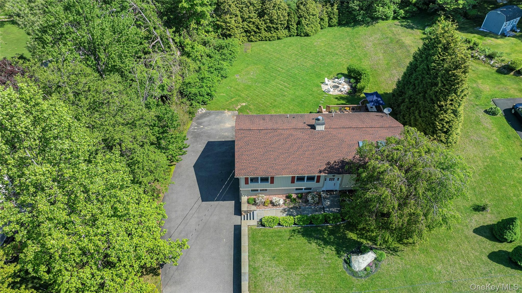 340 Osceola Road Jefferson Valley, NY 10535 - Photo 44 of 48 an aerial view of a house