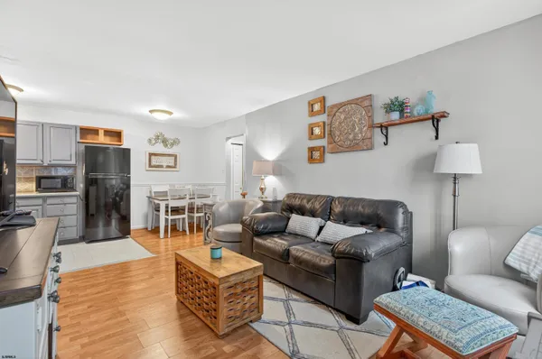 a living room with furniture and a table