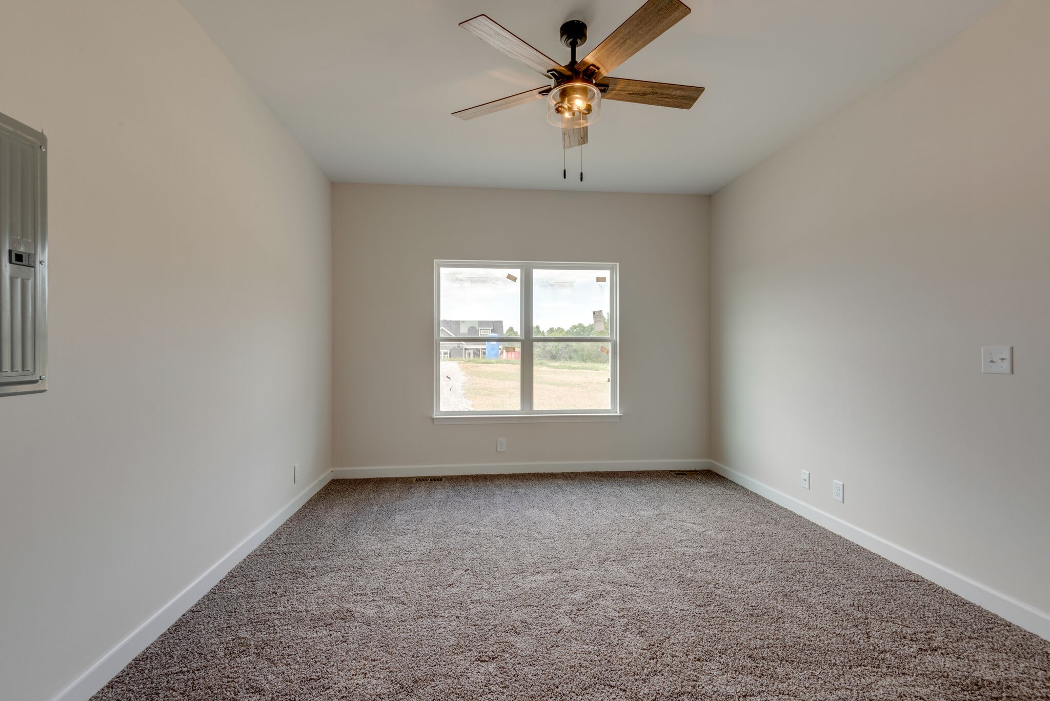 1224 Oak Grove Road Dickson, TN 37055 - Photo 16 of 28 an empty room with a window and a fan