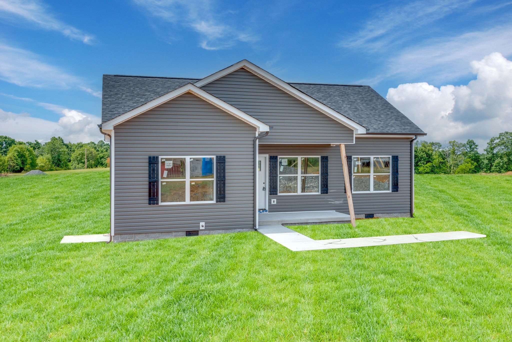 1224 Oak Grove Road Dickson, TN 37055 - Photo 26 of 28 a view of a house with a yard and sitting area
