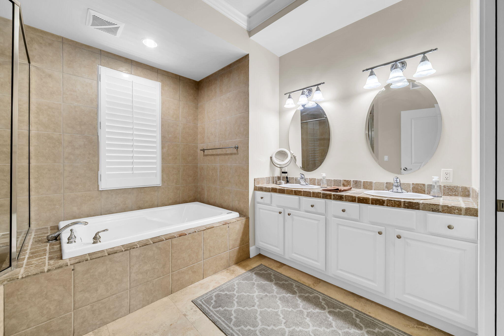 5360 Pine Ridge Lane, Unit 5360 Miramar Beach, FL 32550 - Photo 23 of 44 a bathroom with a double vanity sink and a mirror