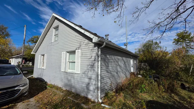 a backyard of a house with lots of green space
