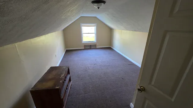view of room with window and hardwood floor