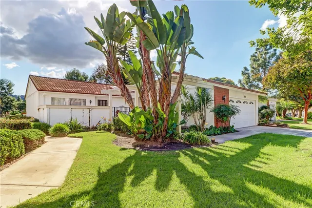 a view of a back yard of the house