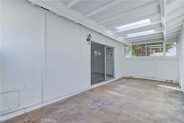 a view of an empty room with window