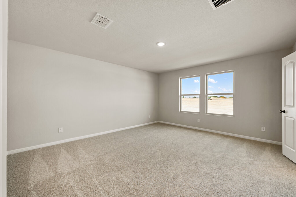 701 Henry Milton Road Georgetown, TX 78626 - Photo 26 of 40 an empty room with a window