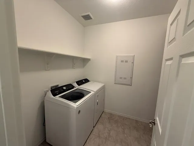 a room with storage and utility