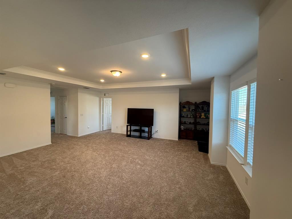 713 Agarita Way Princeton, TX 75407 - Photo 26 of 30 a view of empty room with furniture and window