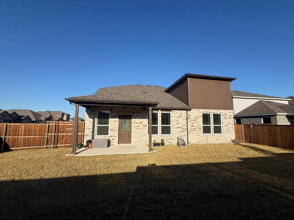 713 Agarita Way Princeton, TX 75407 - Photo 30 of 30 a front view of a house with a yard
