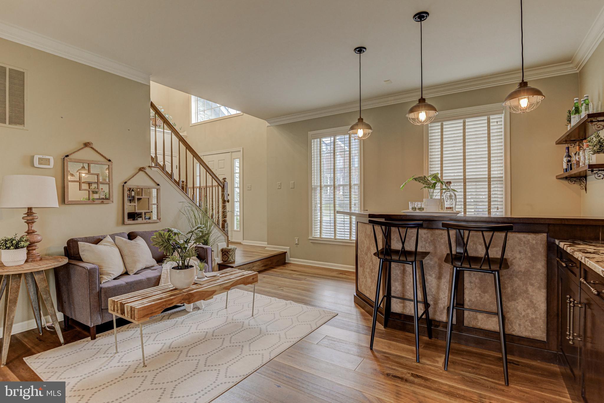 812 Stable Manor Road Reisterstown, MD 21136 - Photo 20 of 53 Living Room with Custom Bar