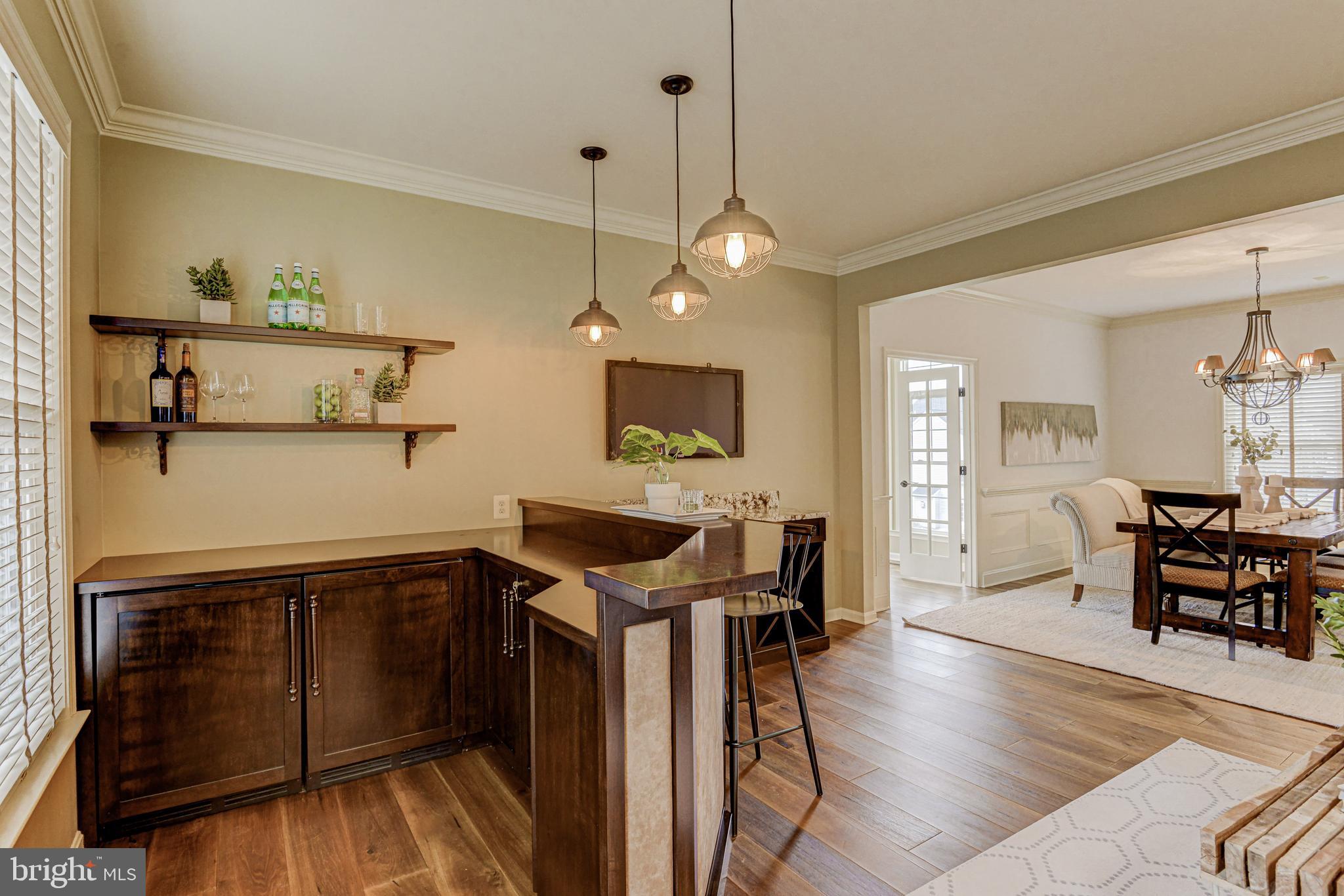 812 Stable Manor Road Reisterstown, MD 21136 - Photo 22 of 53 Living Room with Custom Bar
