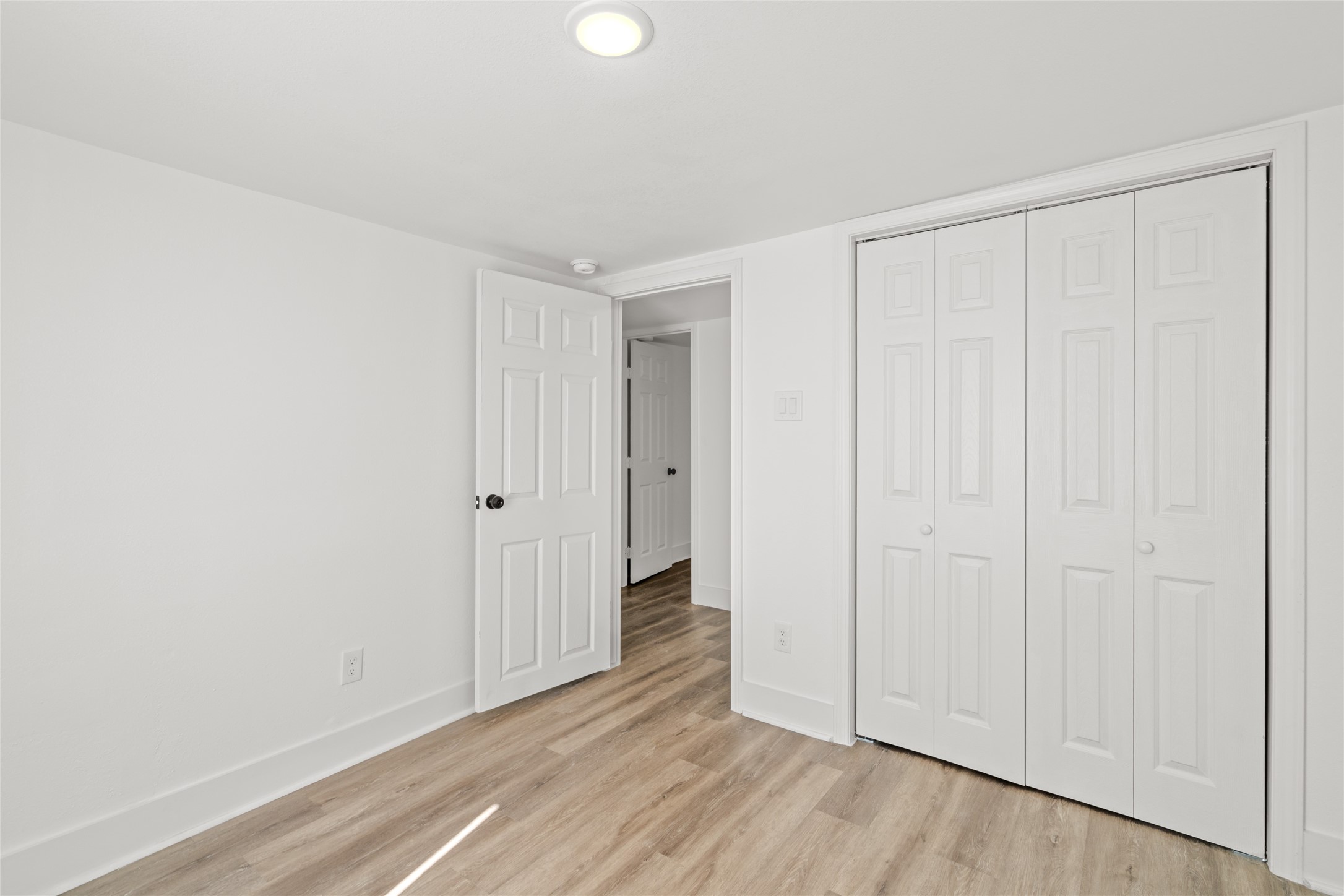 911 Knight Street, Unit D Houston, TX 77022 - Photo 8 of 11 a view of a livingroom with wooden floor