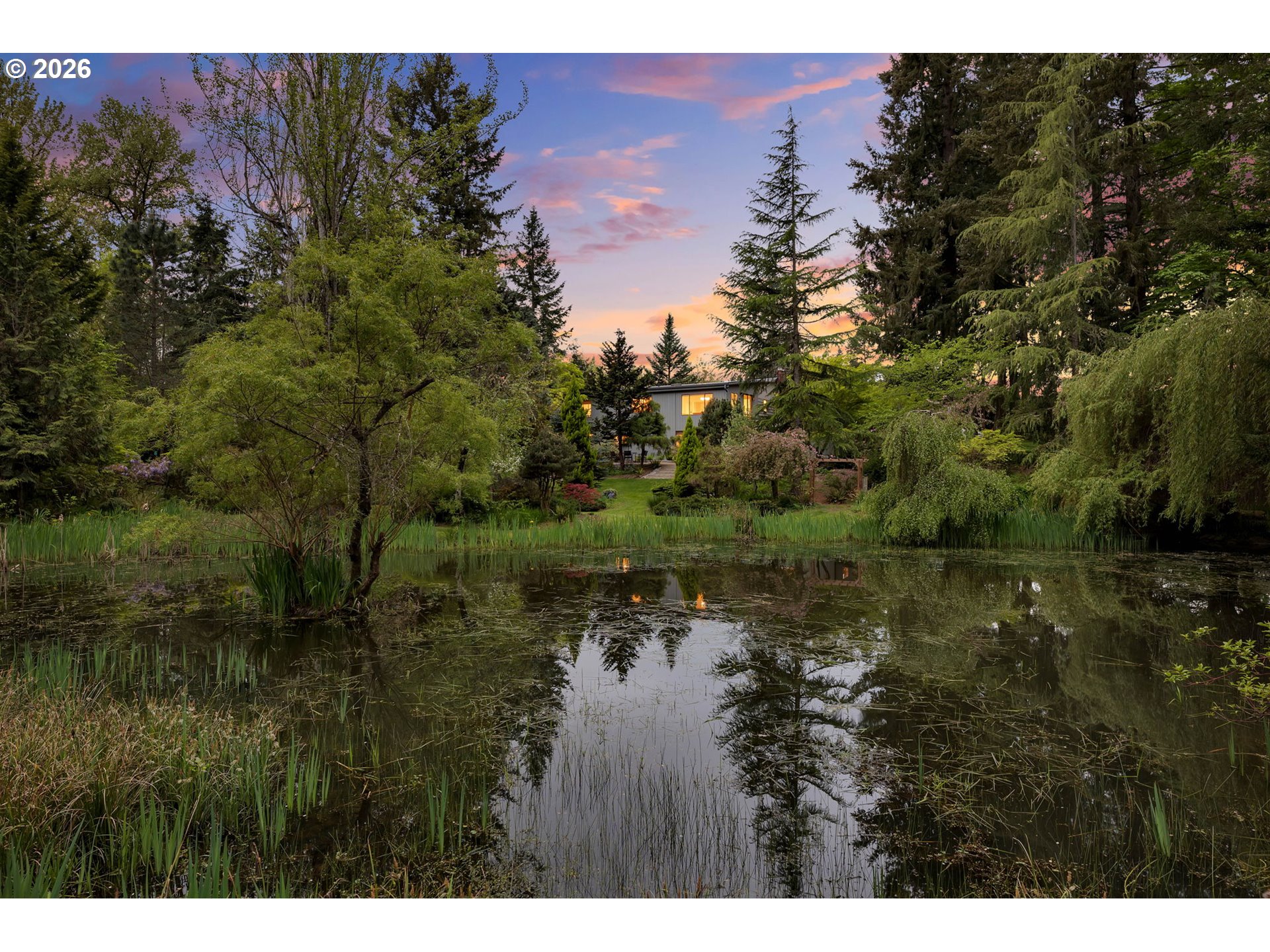 a view of lake with green space