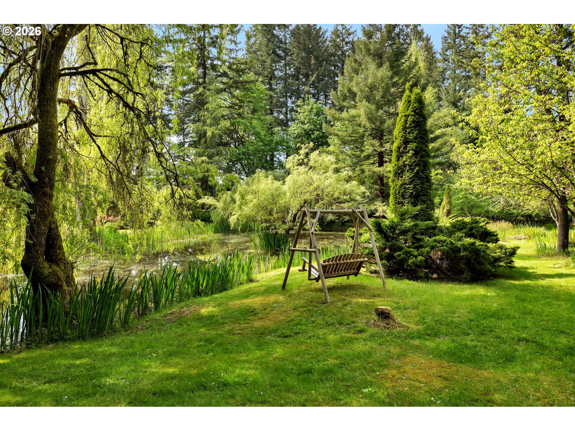 29909 Northwest 51st Avenue Ridgefield, WA 98642 - Photo 30 of 48 a green field with lots of trees