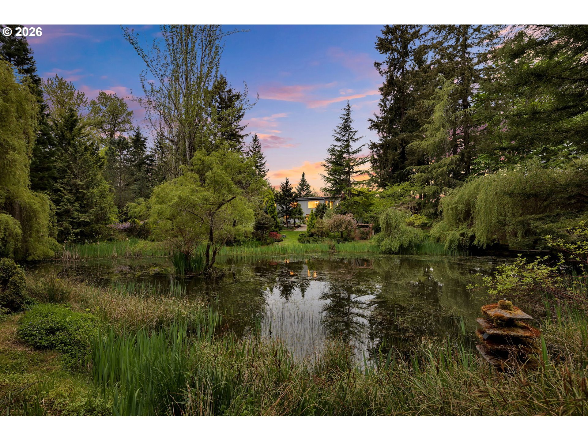 29909 Northwest 51st Avenue Ridgefield, WA 98642 - Photo 48 of 48 a view of a lake with a yard