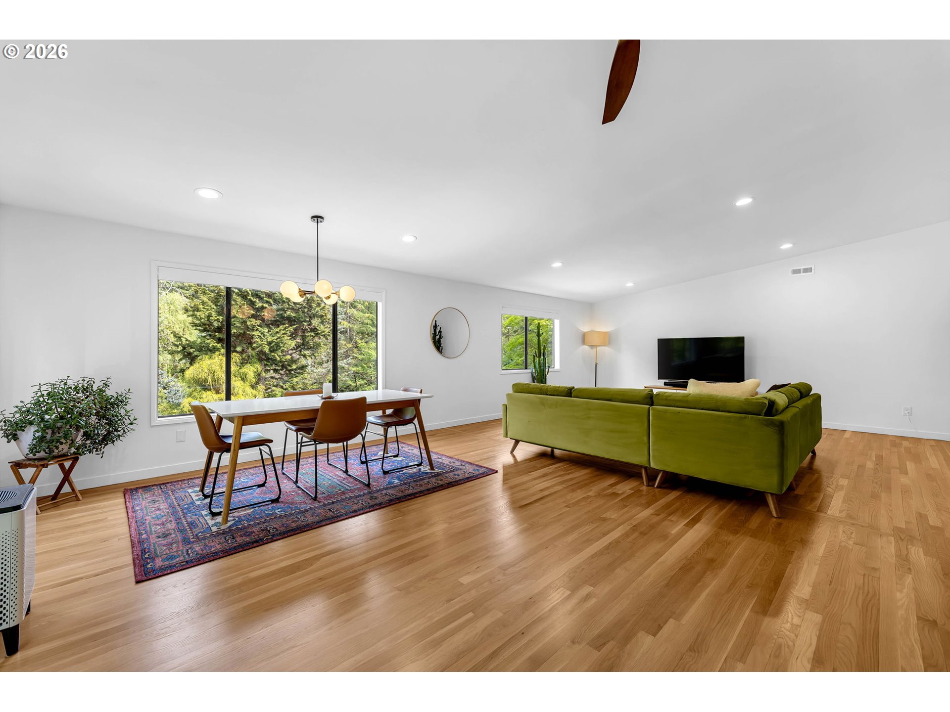 29909 Northwest 51st Avenue Ridgefield, WA 98642 - Photo 10 of 48 a living room with furniture and a wooden floor