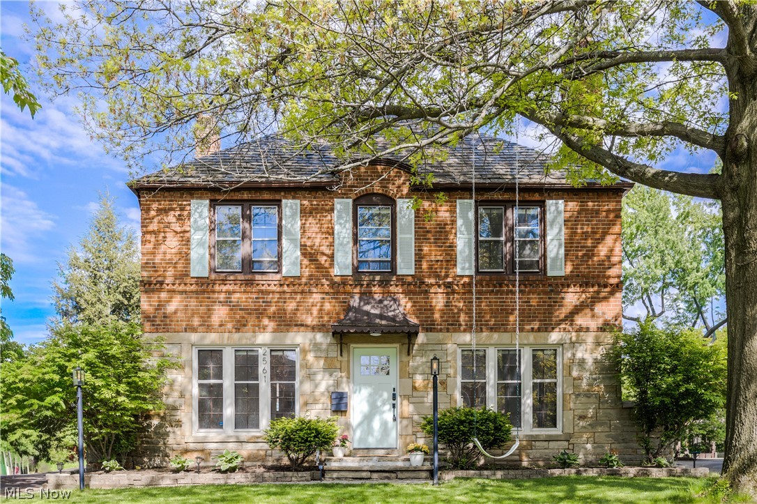 2561 Charney Road Cleveland, OH 44118 - Photo 1 of 47 Welcome to this elegant, solid brick, 5-bedroom colonial home quietly nestled on a desirable and picturesque street in the heart of University Heights