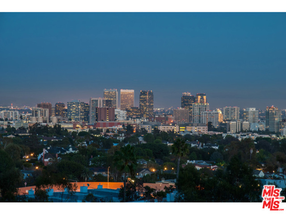 397 Fordyce Road Los Angeles, CA 90049 - Photo 1 of 9 a city view with tall buildings