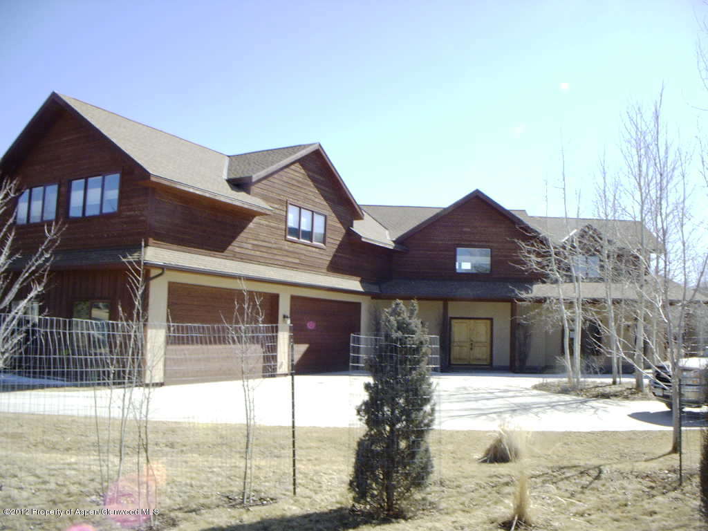 463 Diamond A Ranch Road Carbondale, CO 81623 - Photo 1 of 10 a front view of a house with a yard