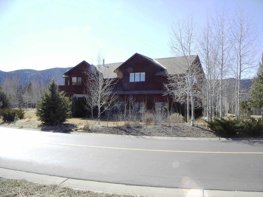 463 Diamond A Ranch Road Carbondale, CO 81623 - Photo 2 of 10 a view of a house with a yard covered with snow