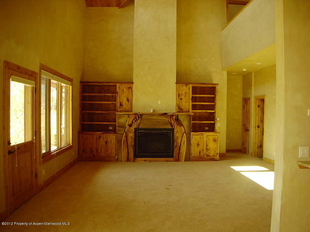 463 Diamond A Ranch Road Carbondale, CO 81623 - Photo 6 of 10 a living room with a bed furniture and a window