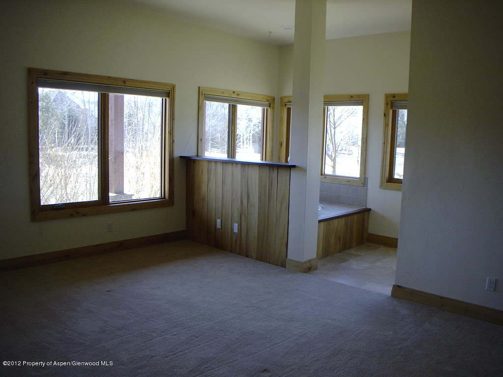 463 Diamond A Ranch Road Carbondale, CO 81623 - Photo 7 of 10 an empty room with windows