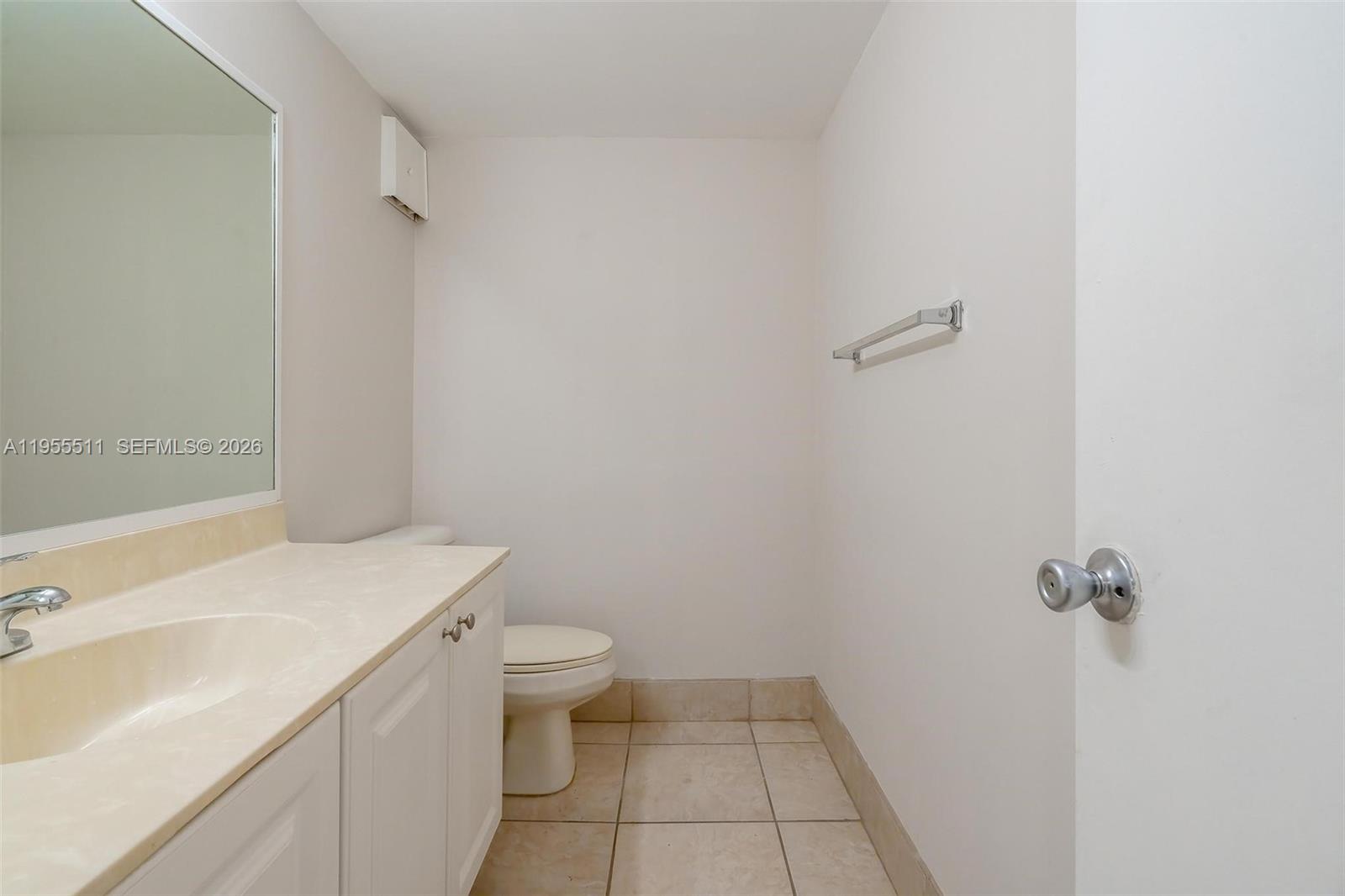 711 North Pine Island Road, Unit 410 Plantation, FL 33324 - Photo 14 of 45 a bathroom with a sink toilet and vanity