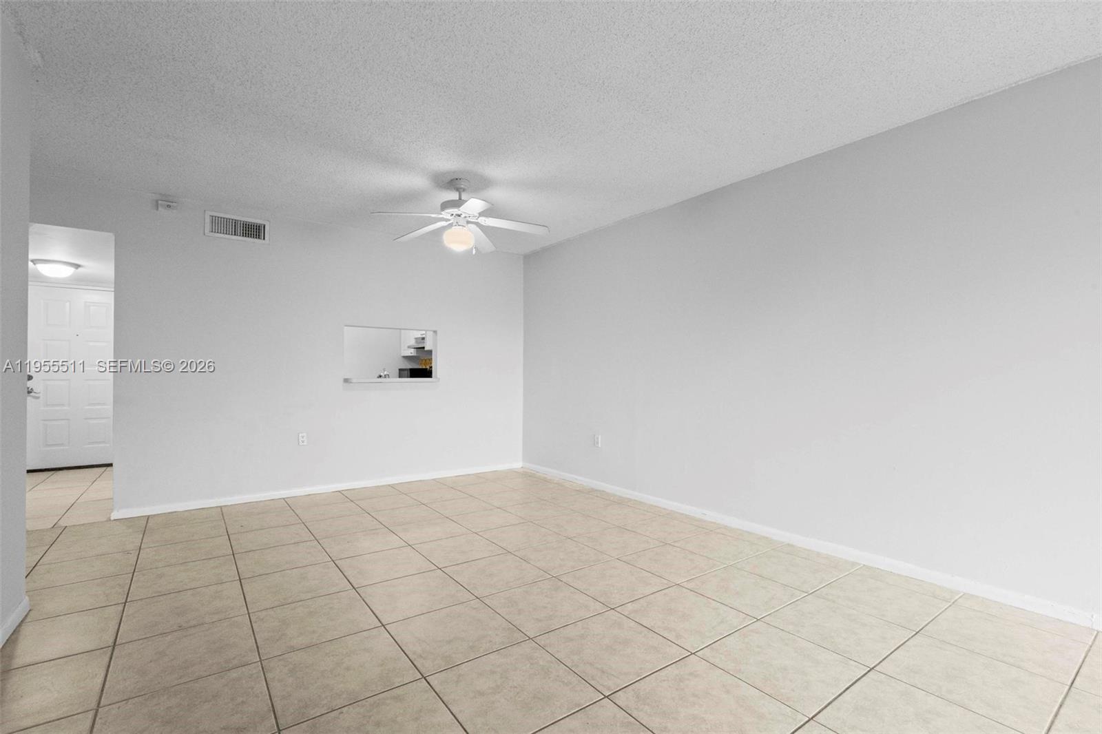 711 North Pine Island Road, Unit 410 Plantation, FL 33324 - Photo 20 of 45 a view of an empty room with a window
