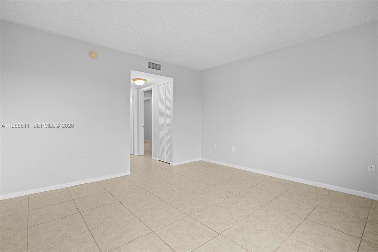 711 North Pine Island Road, Unit 410 Plantation, FL 33324 - Photo 21 of 45 an empty room with window