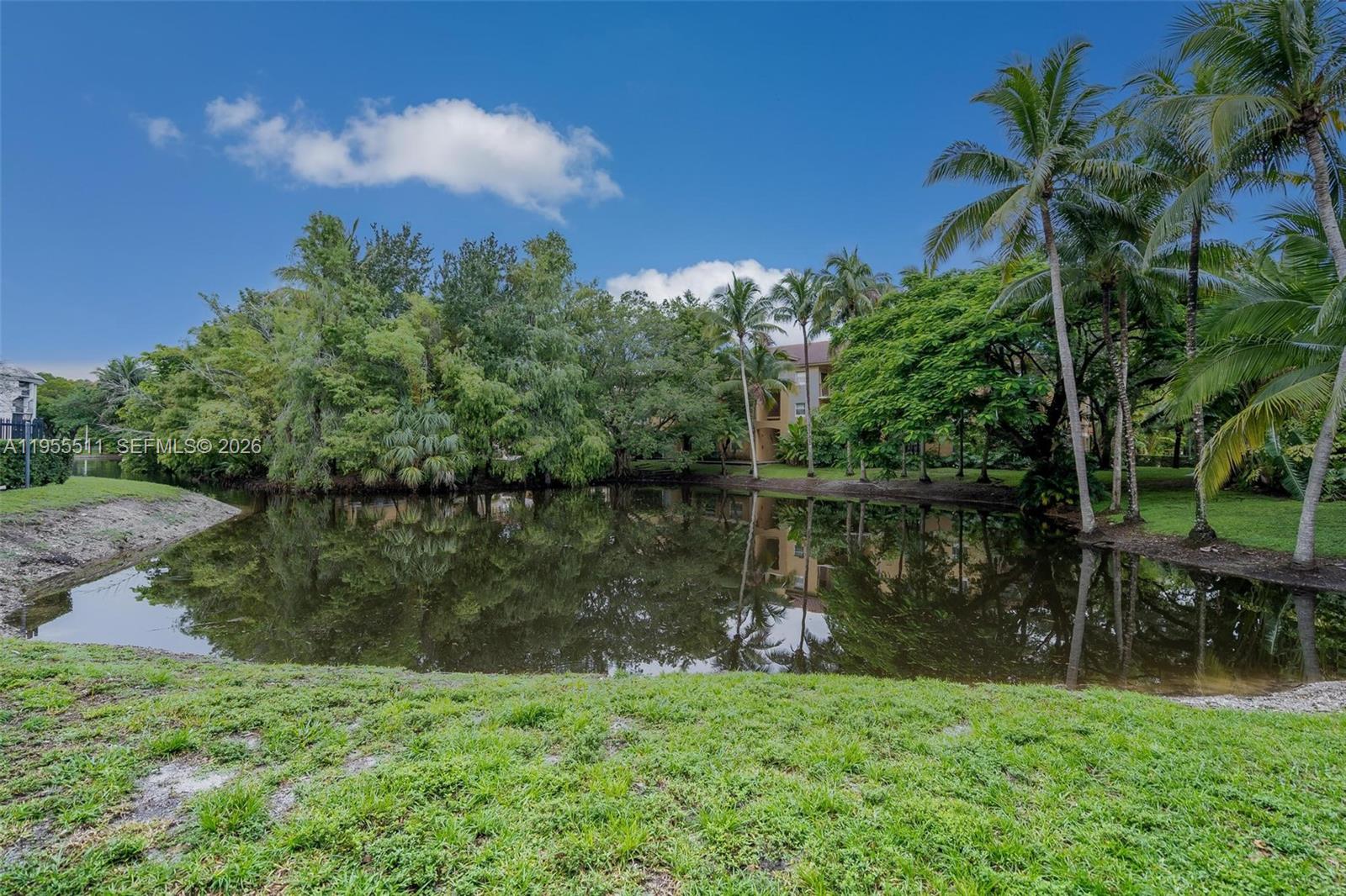 711 North Pine Island Road, Unit 410 Plantation, FL 33324 - Photo 32 of 45 a view of a lake