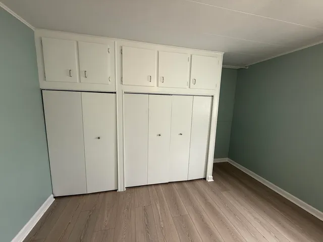 a view of an empty room and entryway