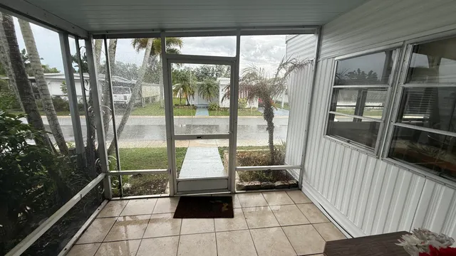 a view of a closet area with an empty room