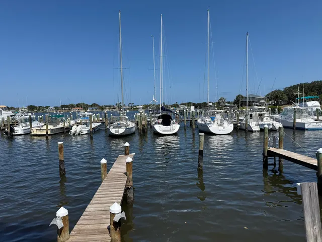 a view of a balcony with chairs