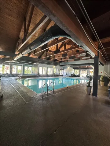 a view of swimming pool with patio