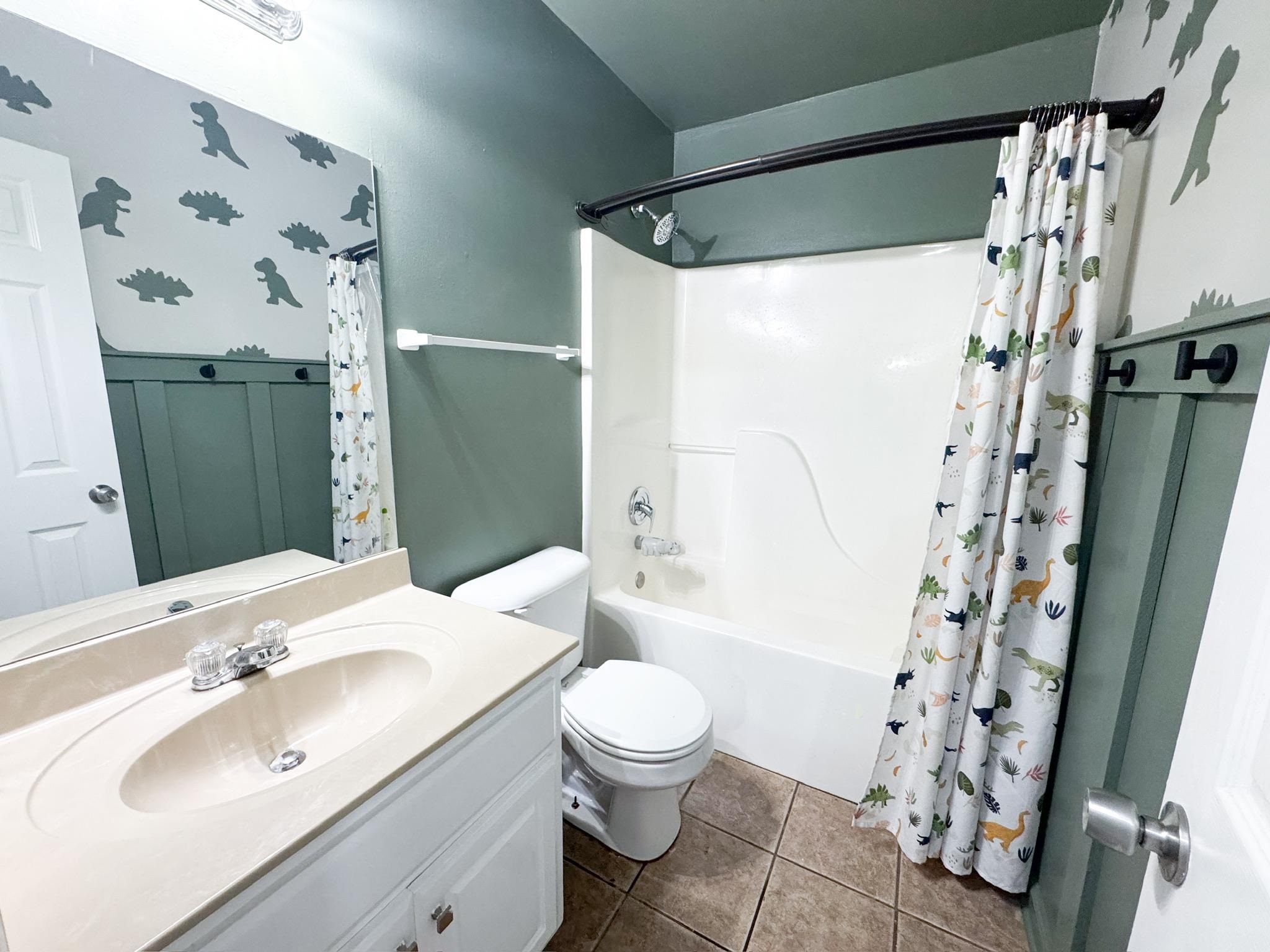 4776 Campground Road Munford, TN 38058 - Photo 8 of 25 a bathroom with a sink toilet and shower