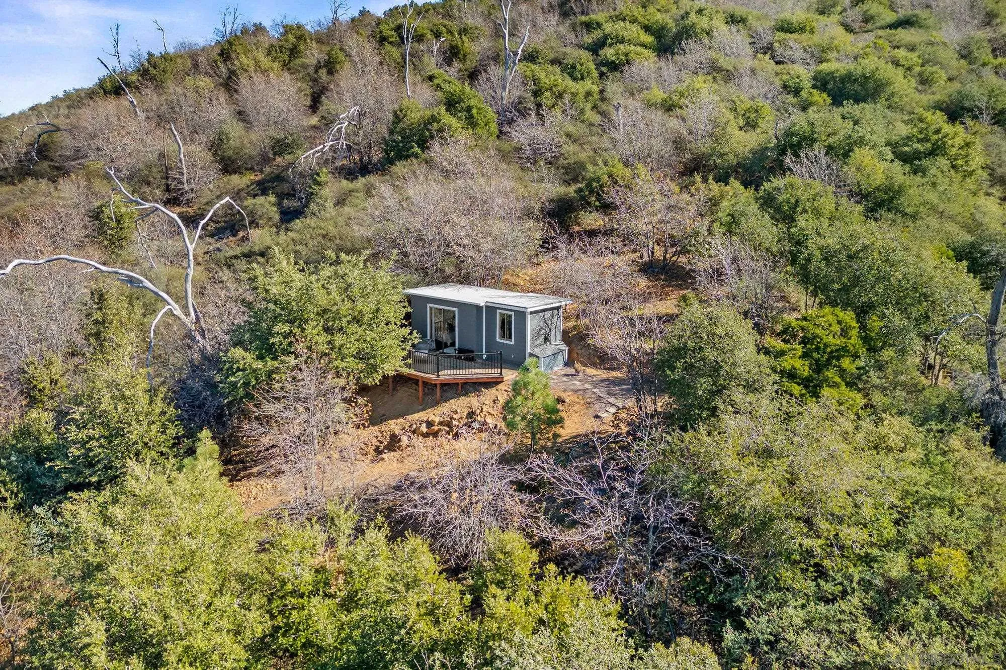5058 Acorn Patch Road Julian, CA 92036 - Photo 22 of 32 a view of a house with a yard