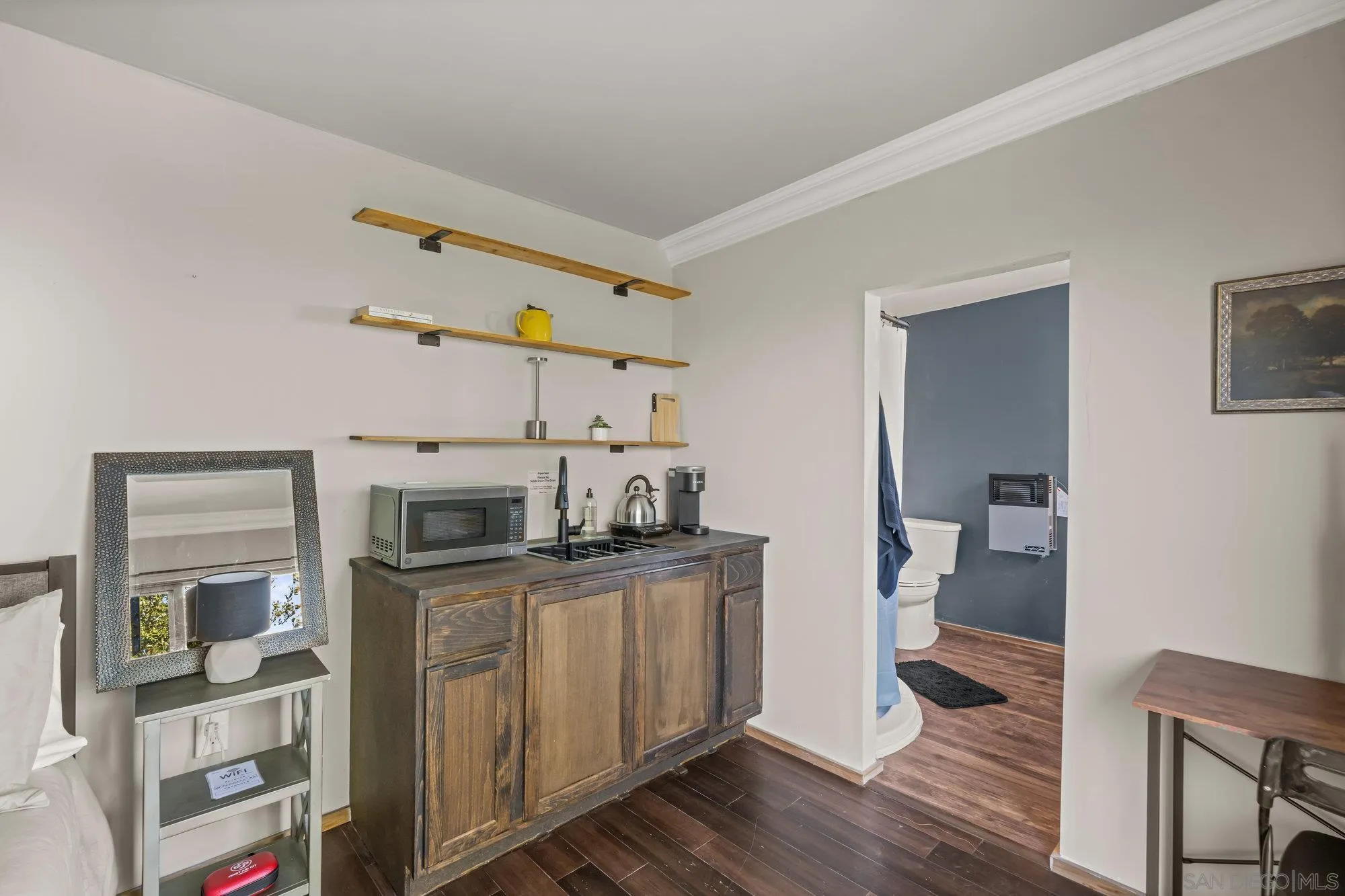 5058 Acorn Patch Road Julian, CA 92036 - Photo 24 of 32 a kitchen with stainless steel appliances granite countertop a stove and cabinets